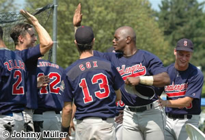 Bennett is congratulated by his teammates after hitting his third homer of the season in the second inning.