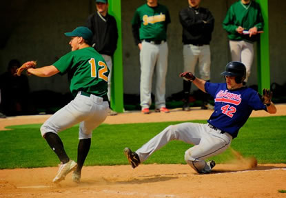 Palatinus slides home past the tag of Andy Rüesch in the eighth inning.